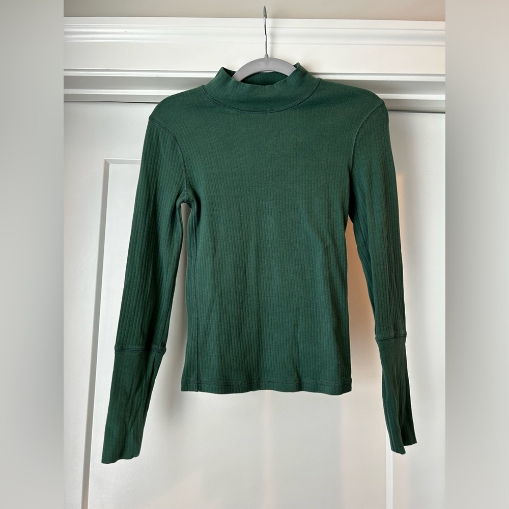 Green ribbed Free People long sleeve turtleneck.
